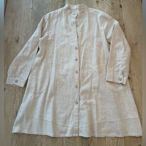 Natural linen blend tunic shirt jacket with a stand collar pockets.